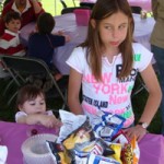Emily and a friend sneak treats