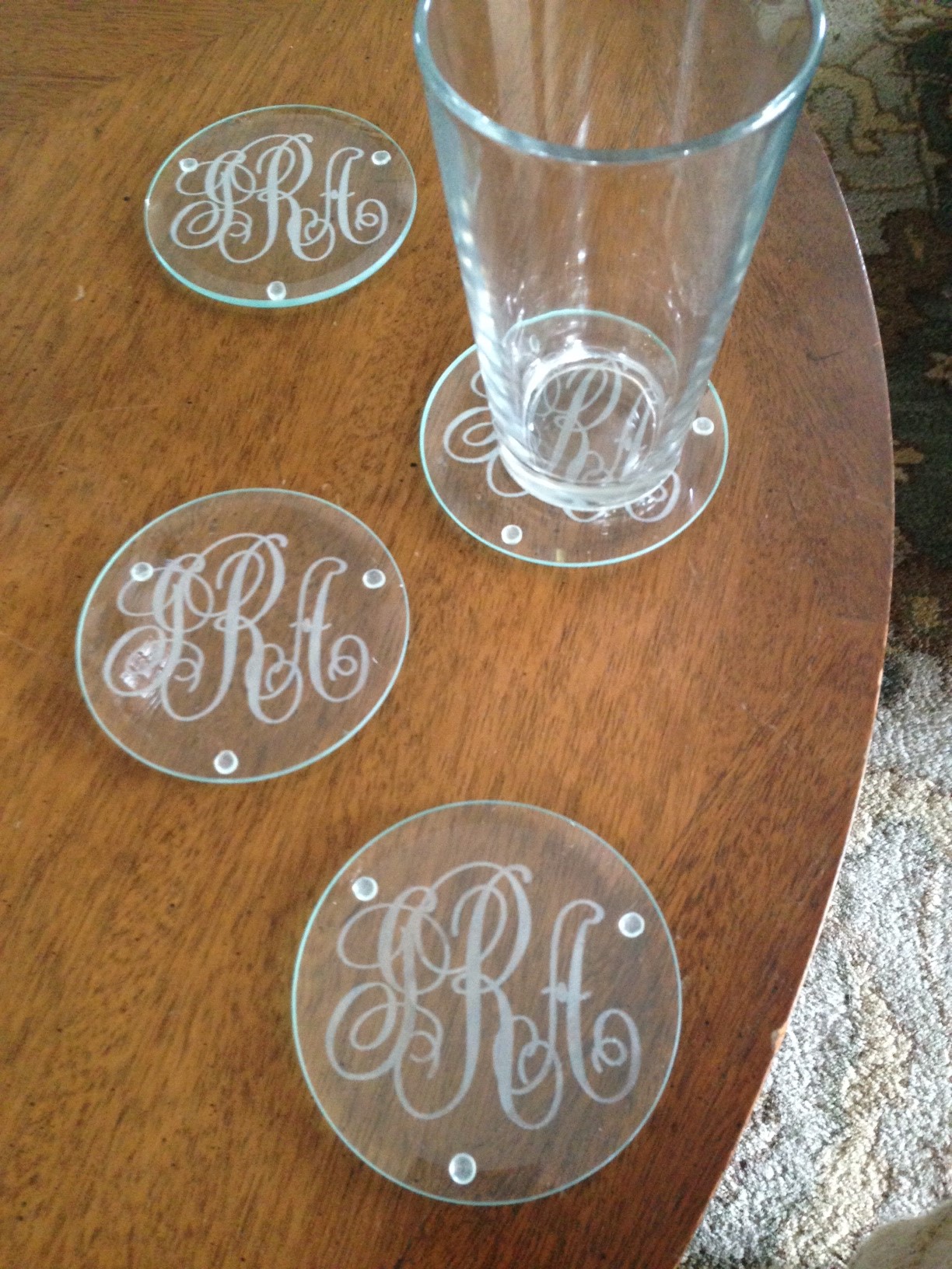 Monogrammed coasters give a personal touch. 